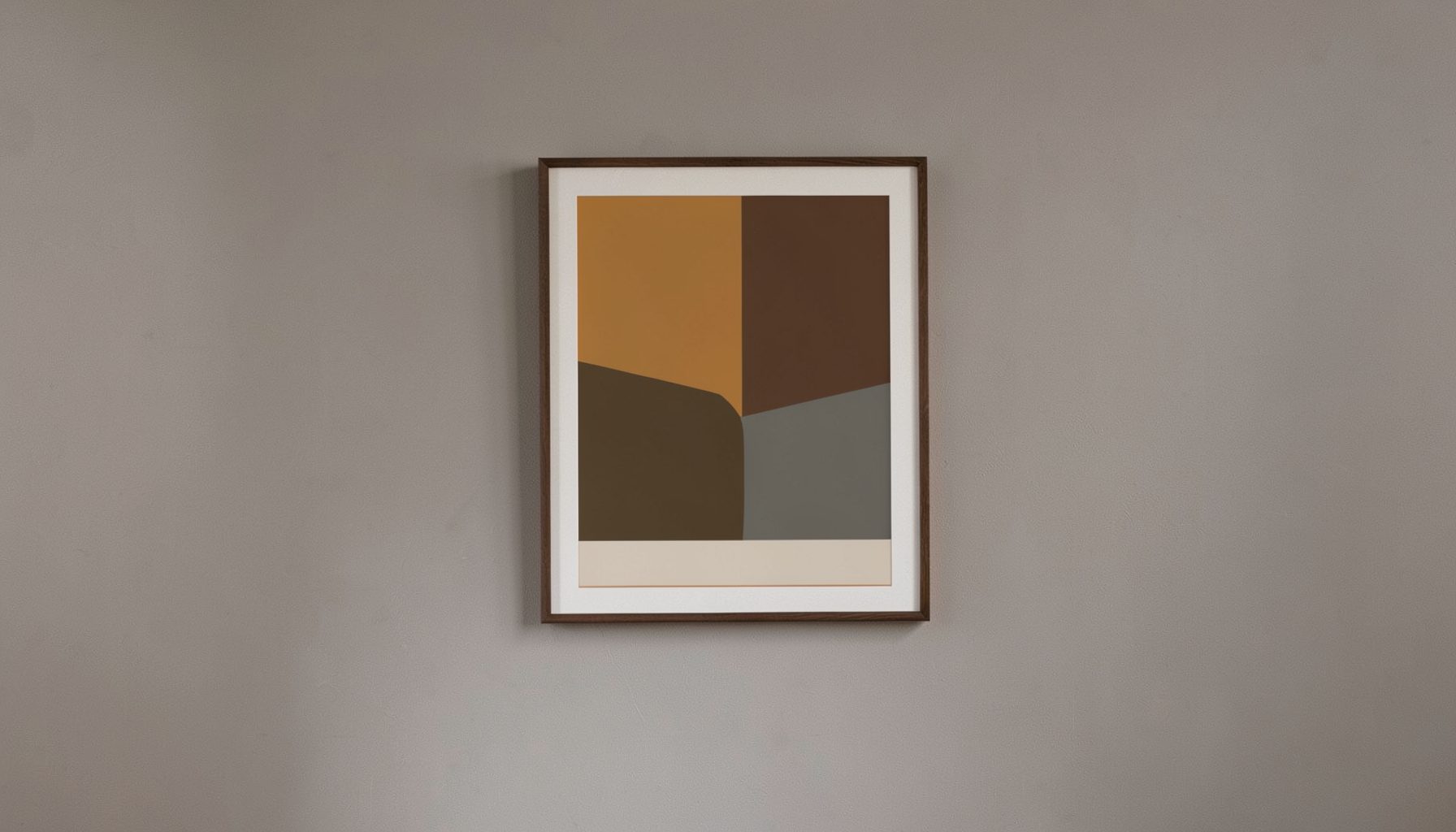 A quiet interior corner with a single framed abstract work in muted ochre and slate